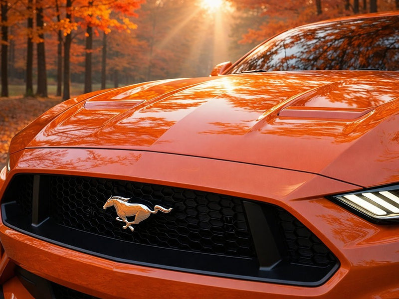 DIY Ford Mustang wrapped in SuperGloss HXONE™ Sunrise Orange automotive vinyl film HXONE302