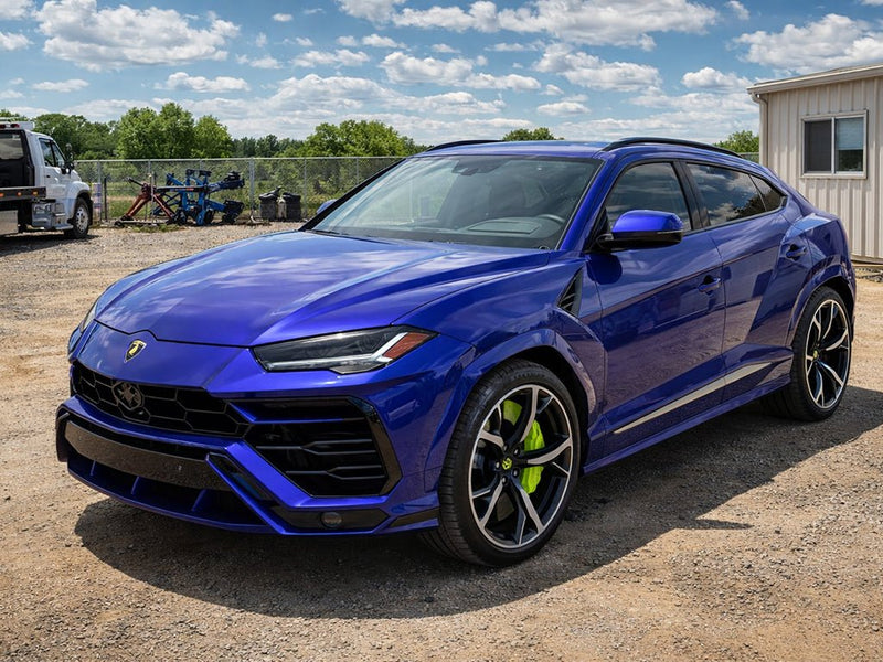 Lamborghini Urus wrapped in Gloss HX30000 Neon Blue automotive vinyl film HX30BNEB