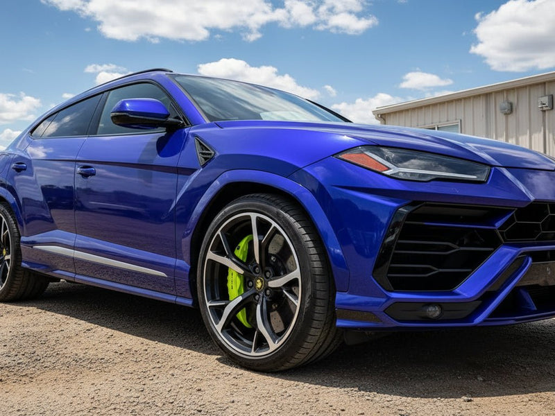Lamborghini Urus wrapped in Hexis Gloss HX30000 Neon Blue wrap film HX30BNEB