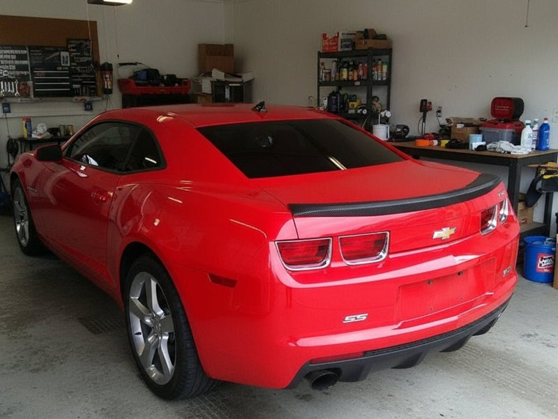 Chevrolet Camaro SS wrapped in Gloss HX30000 Black Carbon Fiber automotive vinyl film HX30CA890B