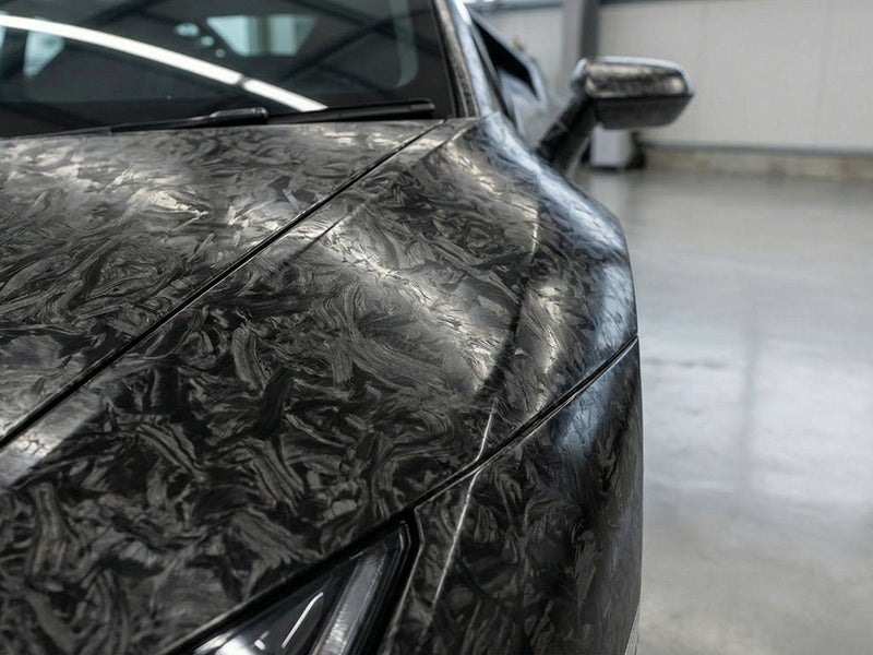 Lamborghini Aventador wrapped in Hexis Carbon Fiber HX30000 Black Forged restyling film HX30CAF89S