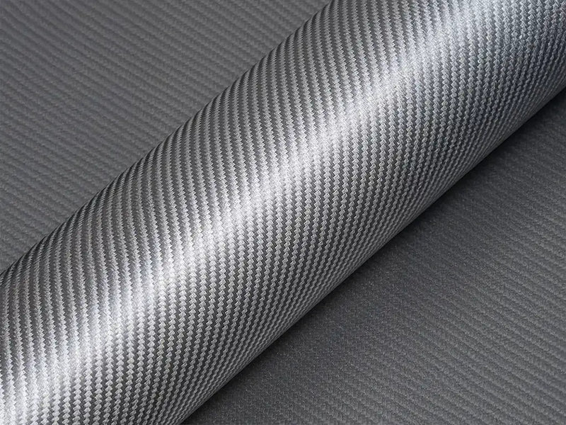 Color swatch of Hexis HX30000 Gloss Graphite Gray Carbon Fiber Vinyl Wrap HX30CAGGRB
