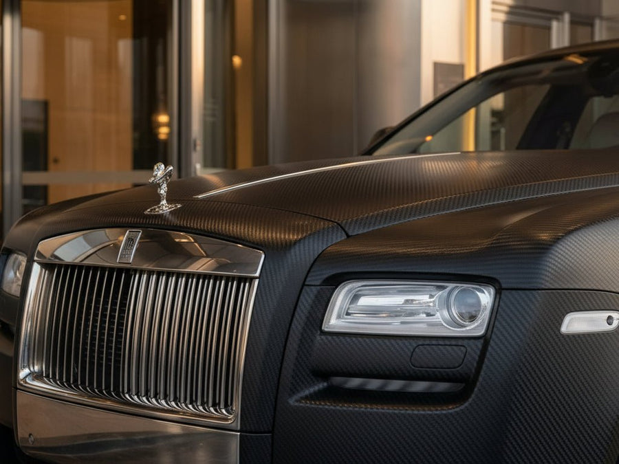 Rolls-Royce Ghost wrapped in Matte HX30000 Raven Black Carbon Fiber car wrap film HX30CANCOB