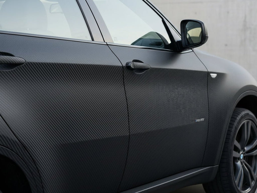 DIY BMW X6 wrapped in Matte HX30000 Raven Black Carbon Fiber wrap film HX30CANCOB