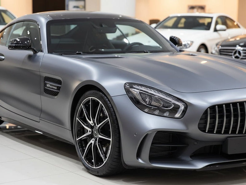 Mercedes-Benz AMG GT wrapped in Ultra Gloss HX30000 Petroleum Black Carbon Fiber vinyl wrap HX30CANPEB