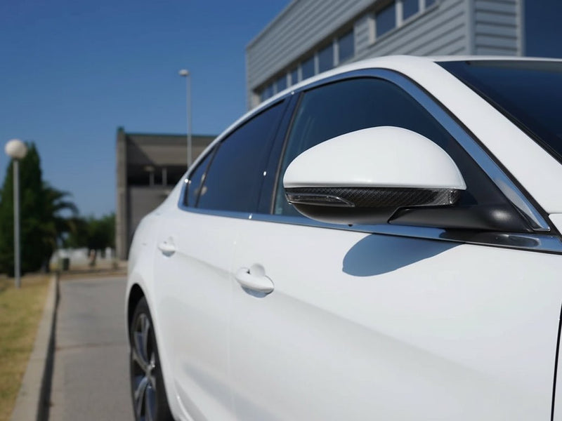 Car wrapped in Gloss HX30000 Black Carbon One Carbon Fiber automotive vinyl film HX30CANPEB