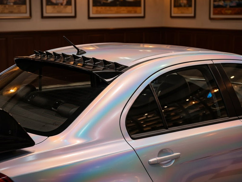 Mitsubishi Lancer wrapped in Hexis Gloss HX30000 Gray Rainbow car wrap film HX30RW990B
