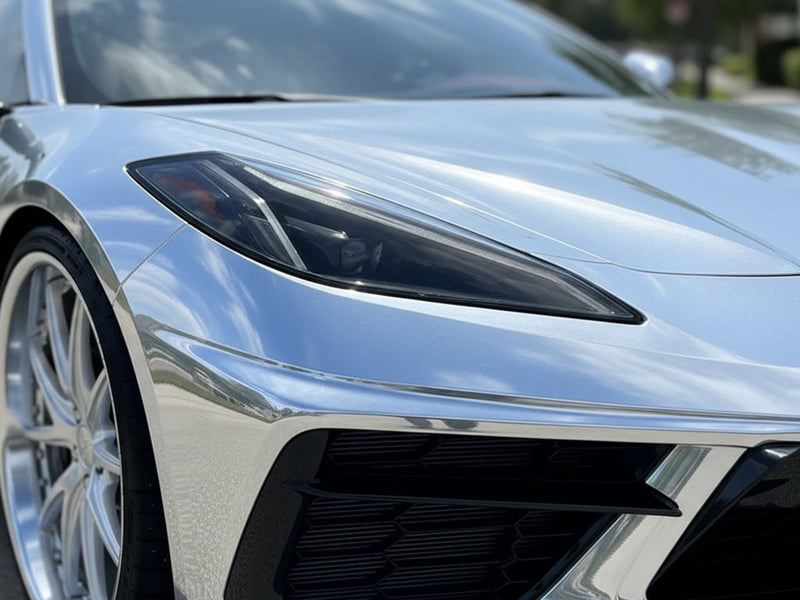 Chevrolet Corvette wrapped in Gloss HX30000 Super Chrome Silver automotive vinyl film HX30SCH01B