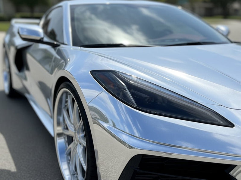 Chevrolet Corvette wrapped in Gloss HX30000 Super Chrome Silver restyling film HX30SCH01B
