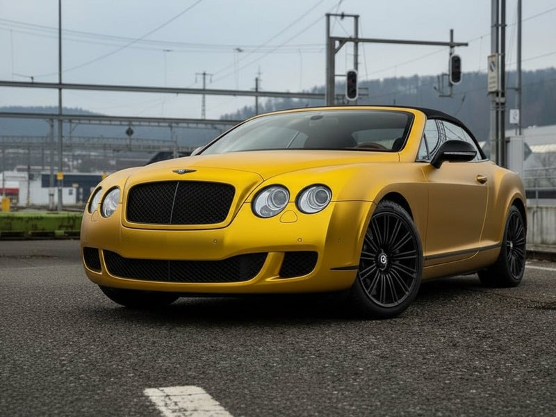 Bentley Continental GT wrapped in Satin HX30000 Super Chrome Gold vinyl wrap HX30SCH07S