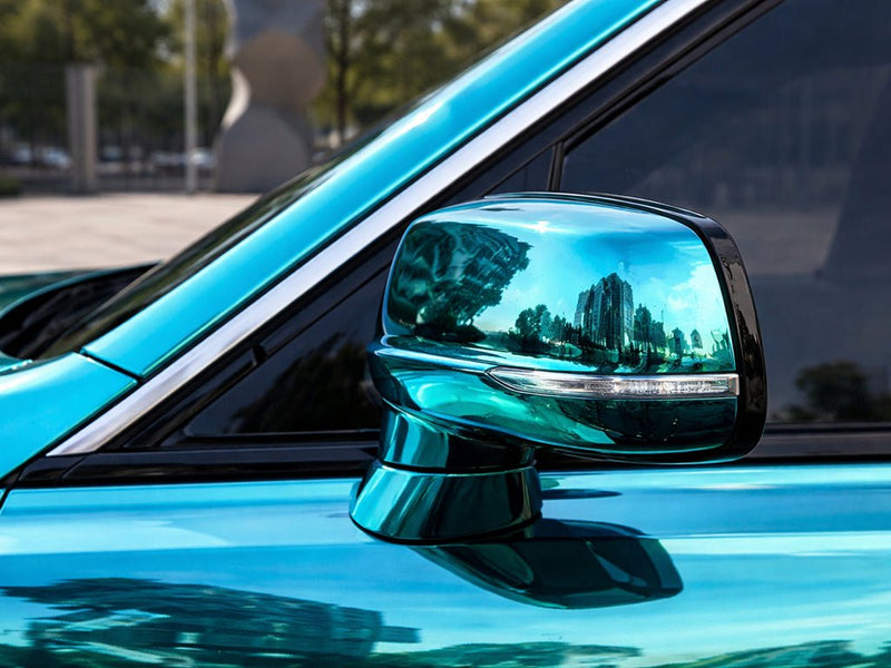 Car wrapped in Hexis Gloss HX30000 Super Chrome Turquoise car wrap film HX30SCH09B