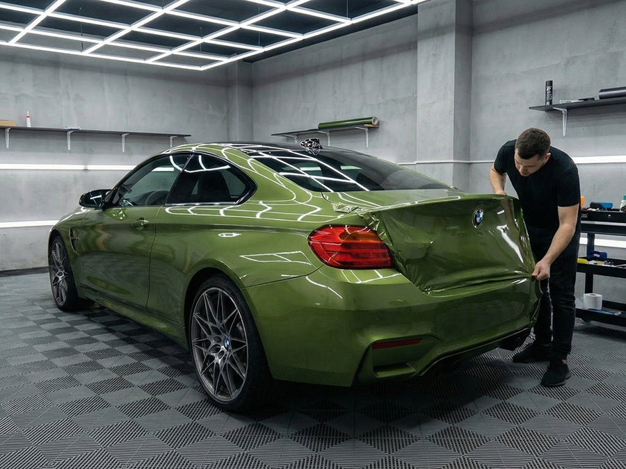 DIY BMW M4 wrapped in Super Gloss HXONE™ Vintage Green restyling film HXONE700