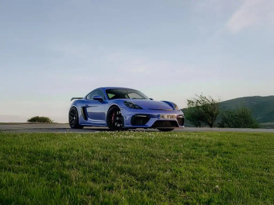 Porsche 718 Cayman GT4 wrapped in Super Gloss Pearlescent Pearl Lavender vinyl wrap