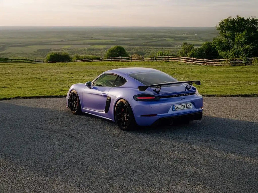 Porsche 718 Cayman GT4 wrapped in SuperGloss Pearlescent Pearl Lavender restyling film