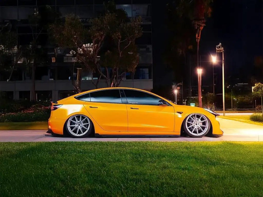 Tesla Model 3 wrapped in Inozetek SuperGloss Metallic Dandelion Yellow wrap film