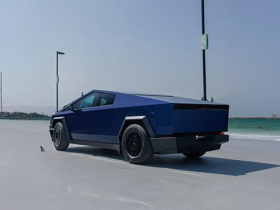 Tesla Cybertruck wrapped in SuperGloss Metallic Midnight Blue car wrap film