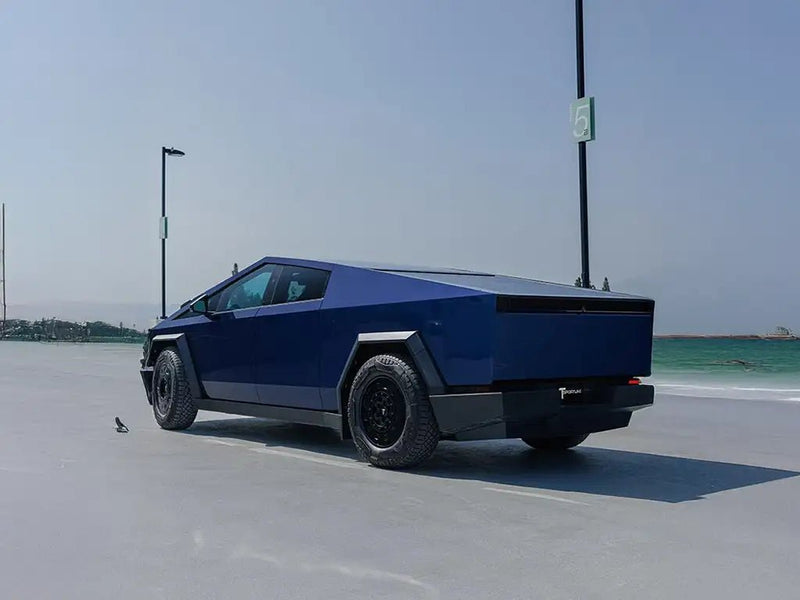 Tesla Cybertruck wrapped in SuperGloss Metallic Midnight Blue car wrap film