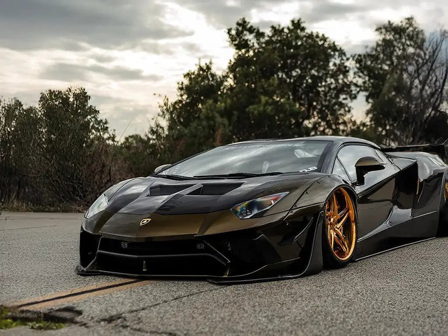 DIY Lamborghini Aventador wrapped in SuperGloss Metallic Midnight Gold wrap film