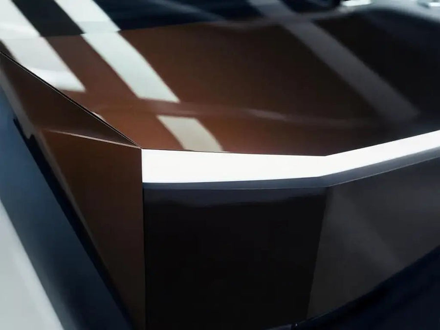 Tesla Cybertruck wrapped in SuperGloss Metallic Mocha restyling film