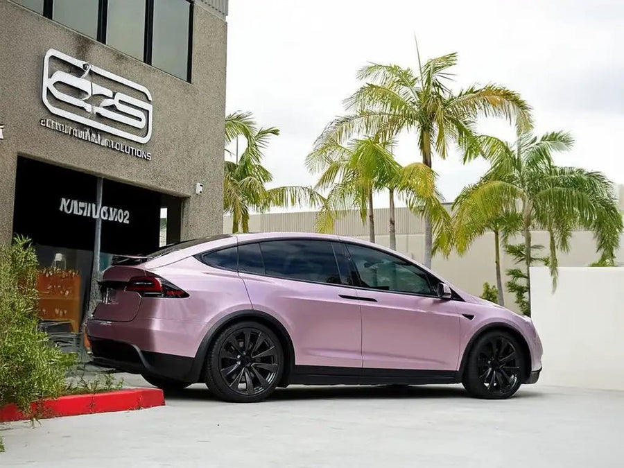 Tesla Model X wrapped in Inozetek SuperGloss Metallic Rose restyling film