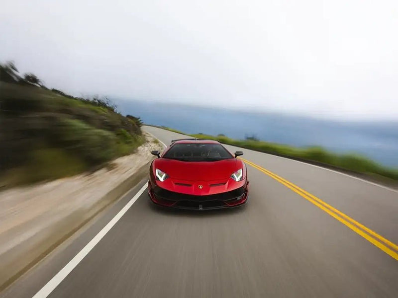 Lamborghini Aventador wrapped in SuperGloss Metallic Vampire Red vinyl wrap