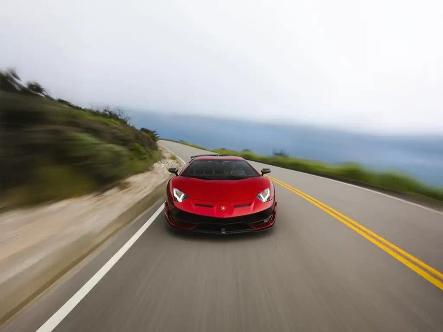 Lamborghini Aventador wrapped in SuperGloss Metallic Vampire Red vinyl wrap