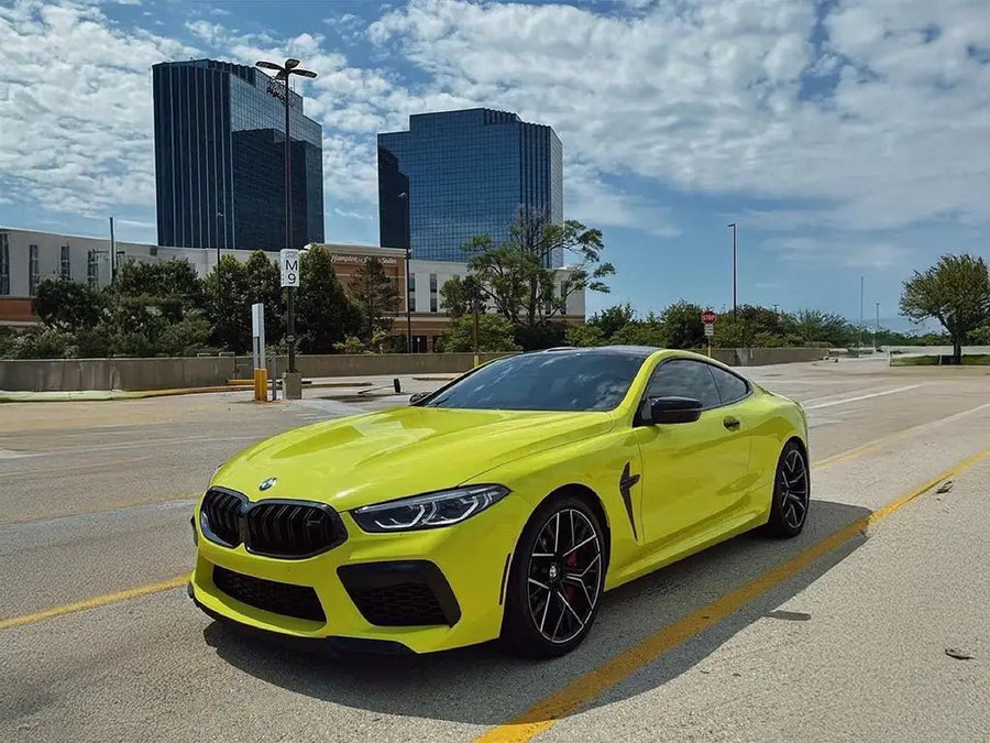 BMW M8 wrapped in Inozetek SuperGloss Racing Yellow car wrap film