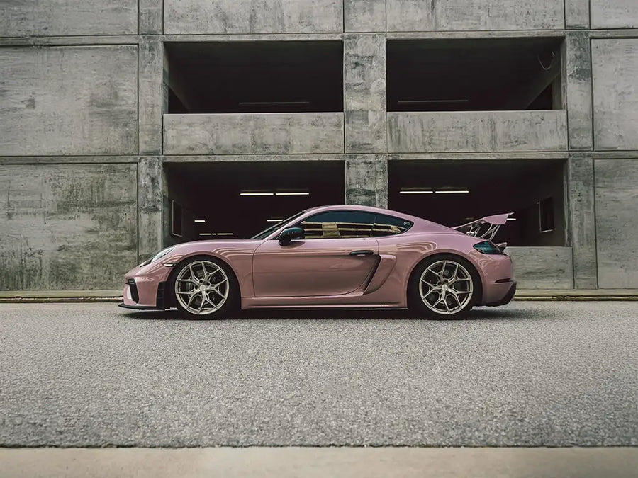 Porsche Cayman wrapped in Inozetek Super Gloss Rosewood Pink car wrap film