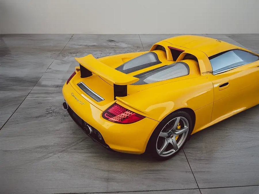 DIY Porsche Carrera GT wrapped in Super Gloss Signal Yellow vinyl wrap