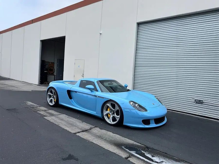 DIY Porsche Carrera GT wrapped in SuperGloss Snow Blue automotive vinyl film