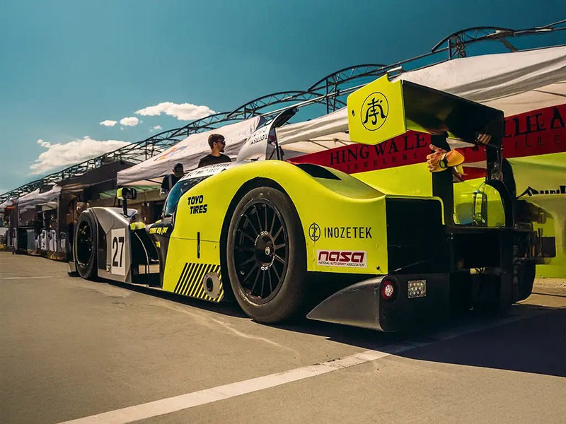 Radical SR3 wrapped in Inozetek None Limited Special Edition Student Driver Racing Green restyling film
