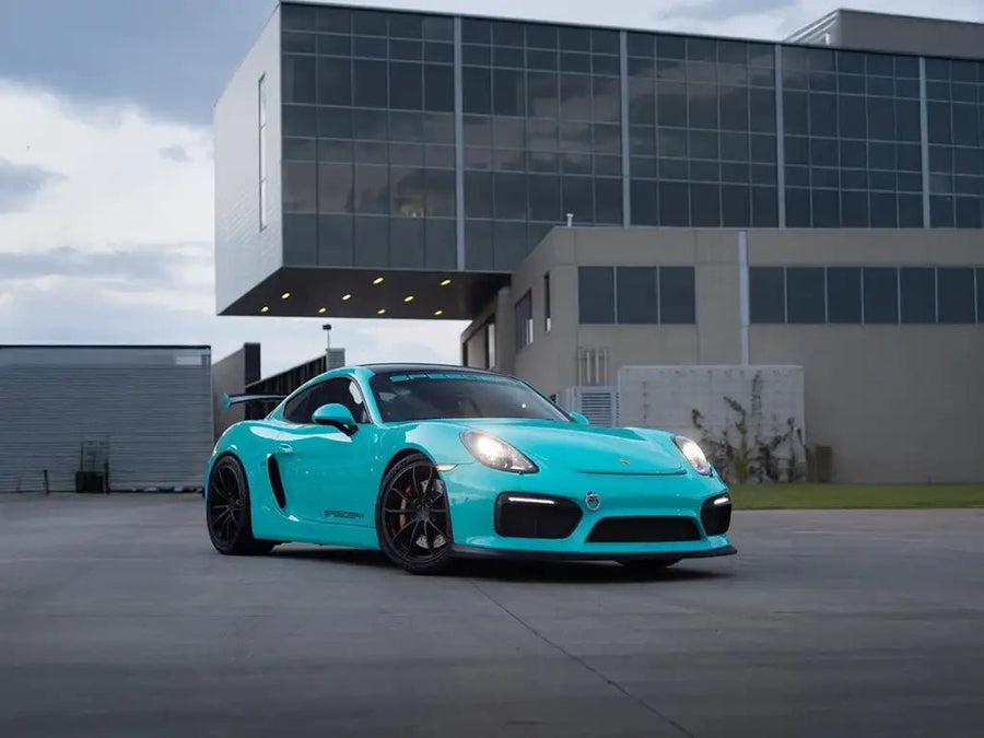 Porsche Cayman wrapped in Inozetek SuperGloss Turquoise Dream car wrap film