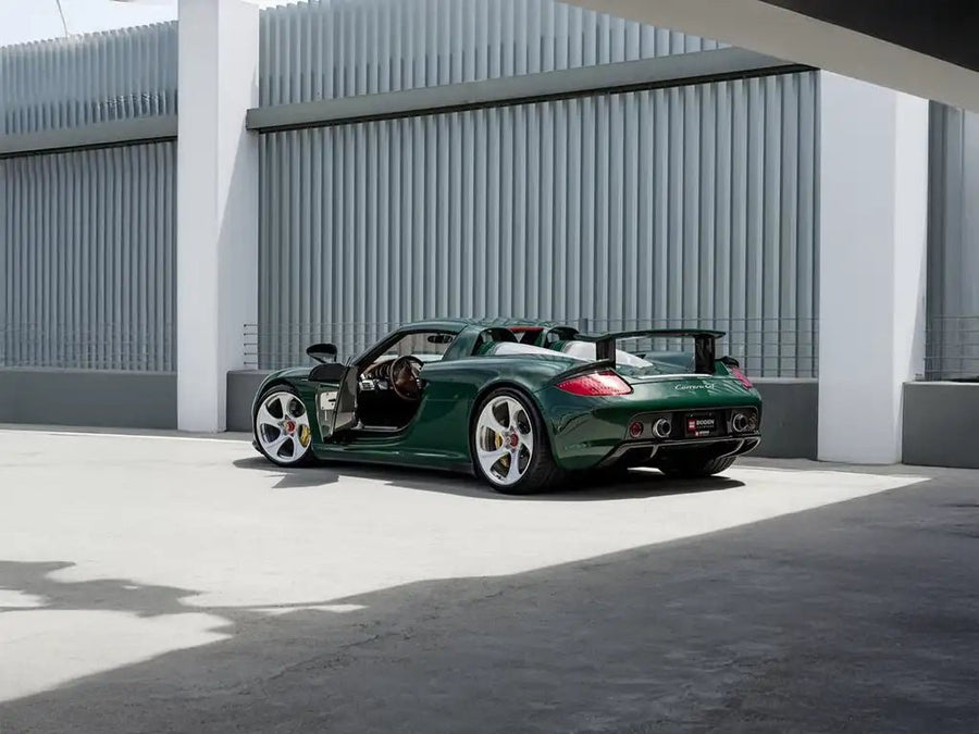 Porsche Carrera GT wrapped in Inozetek Super Gloss Vintage Racing Green car wrap film