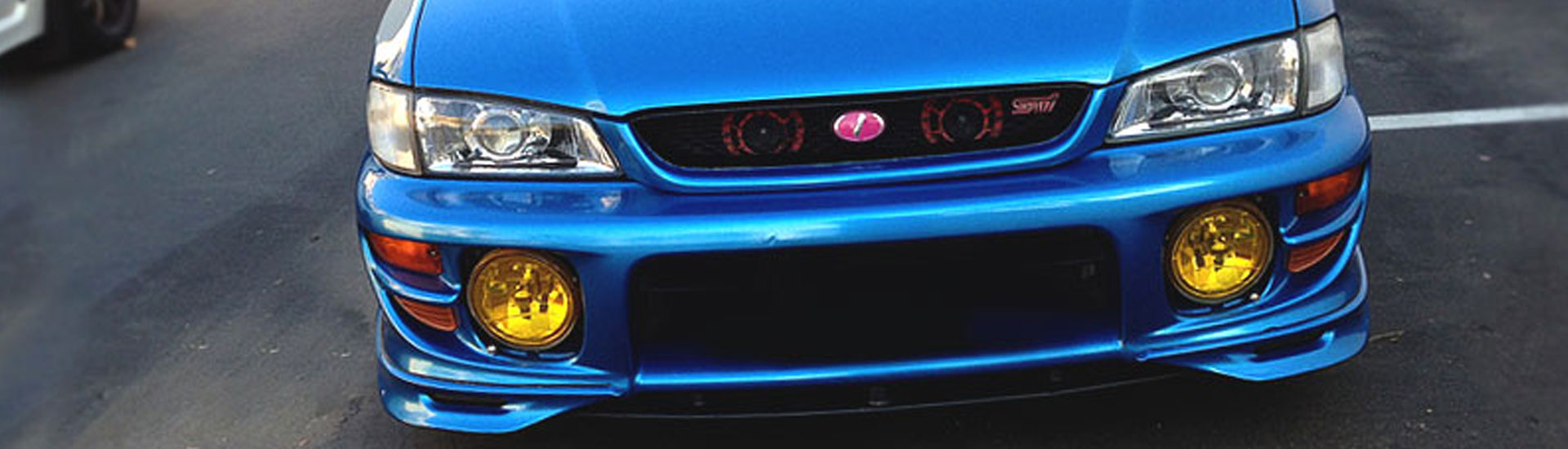 Blue Subaru with tinted fog lights
