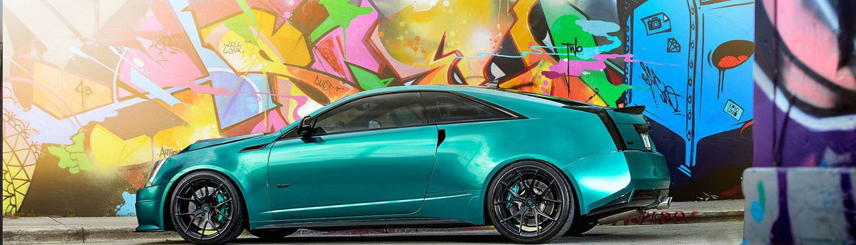 Cadillac vehicle wrap in gloss black