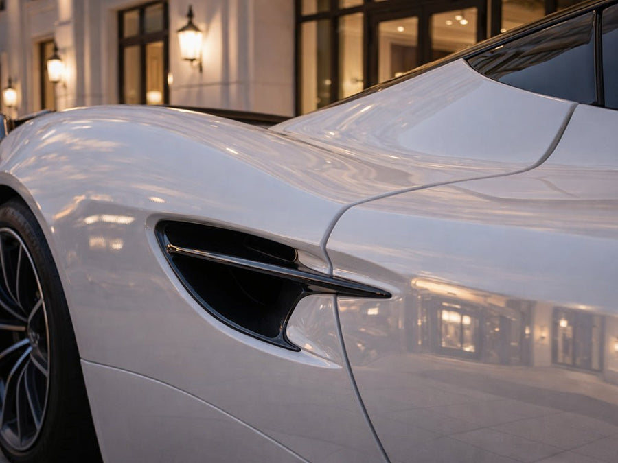 Aston Martin DB11 wrapped in Super Gloss HXONE™ Supreme White restyling film HXONE100