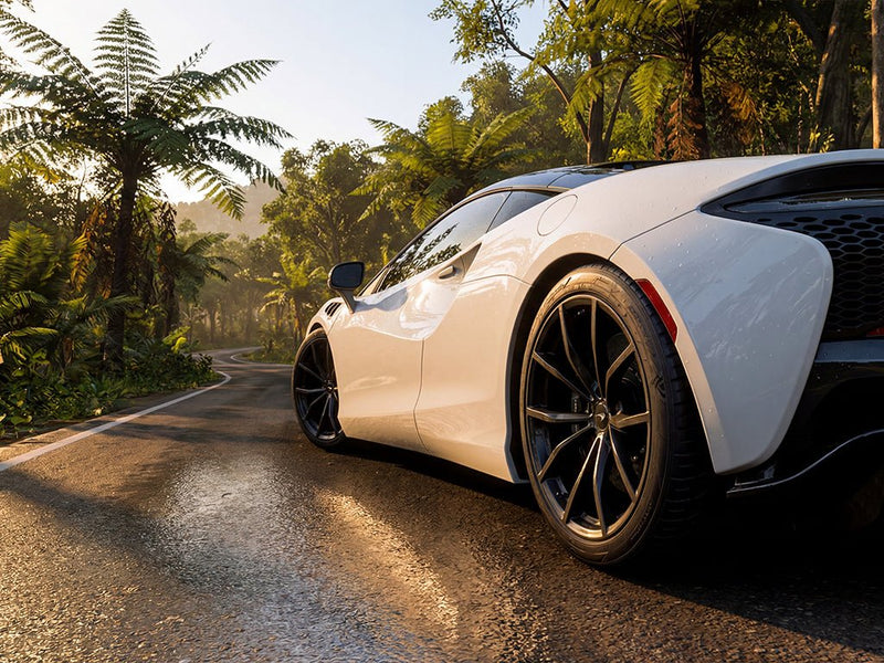 McLaren GT wrapped in Gloss HX20000 Polar White wrap film HX20001B