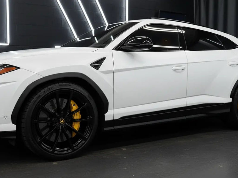 Lamborghini Urus wrapped in Matte HX20000 Lapland White restyling film HX20002M