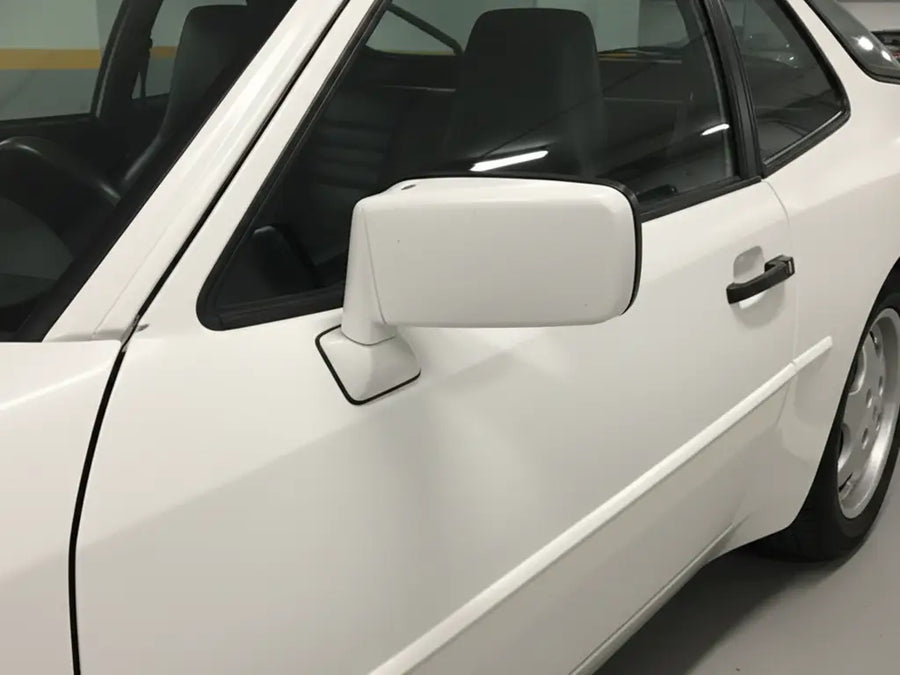 Porsche 944 wrapped in Matte HX20000 Glacier White vinyl wrap HX20003M