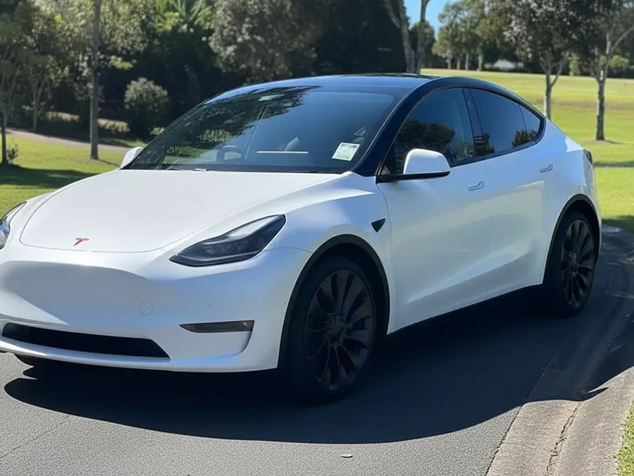 Tesla Y wrapped in Matte HX20000 Glacier White car wrap film HX20003M