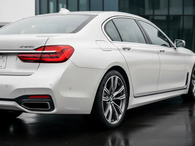 DIY BMW 7 Series wrapped in Gloss HX20000 Mountain Peak White vinyl wrap HX20012B