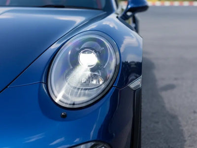 Porsche 911 wrapped in Hexis Gloss HX20000 Firmament Blue restyling film HX20033B