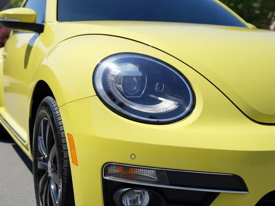 Volkswagen Beetle wrapped in Hexis Gloss HX20000 Lemon Yellow vinyl wrap HX20108B