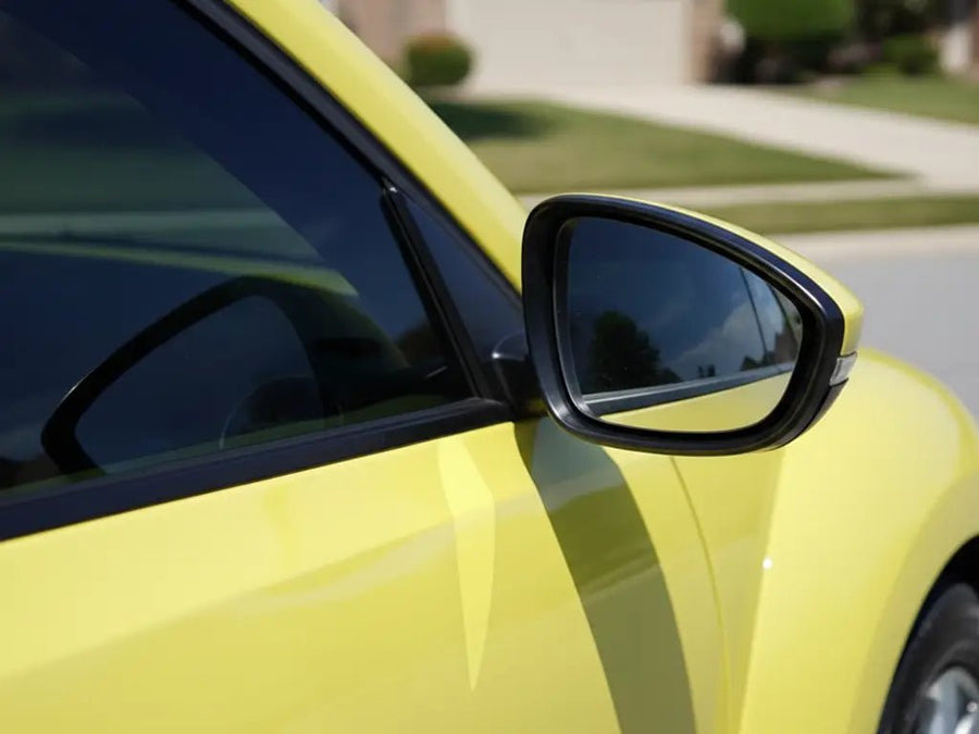 Volkswagen Beetle wrapped in Gloss HX20000 Lemon Yellow automotive vinyl film HX20108B