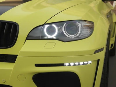 BMW X6 wrapped in Hexis Gloss HX20000 Lemon Yellow restyling film HX20108B