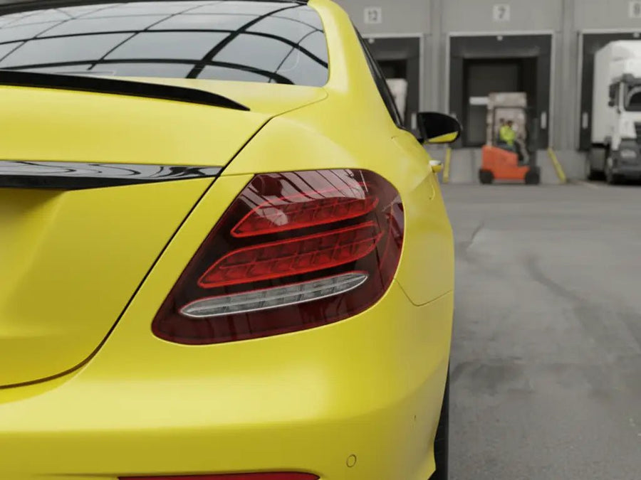 Mercedes-Benz C-Class wrapped in Matte HX20000 Lemon Yellow automotive vinyl film HX20108M