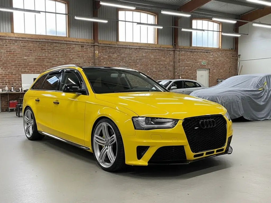 Audi RS4 Avant wrapped in Gloss HX20000 Sun Yellow car wrap film HX20109B