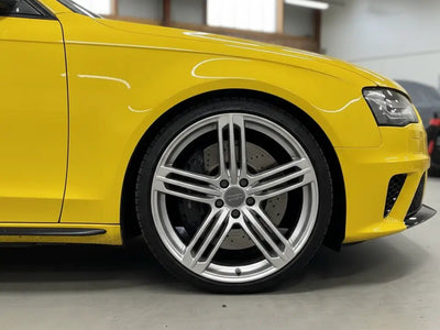 Audi S4 wrapped in Hexis Gloss HX20000 Sun Yellow wrap film HX20109B