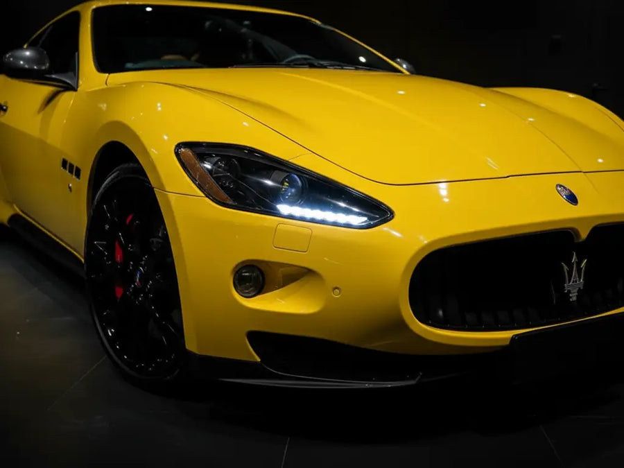 Maserati GranTurismo wrapped in Hexis Gloss HX20000 Daffodil Yellow car wrap film HX20123B