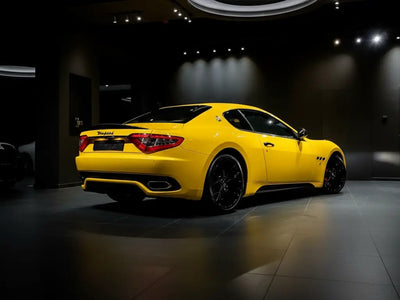 Maserati GranTurismo wrapped in Gloss HX20000 Daffodil Yellow car wrap film HX20123B